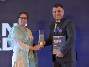 Liverpool Hope University graduate, Adil Raza, collects his British Council Study UK Alumni Award.